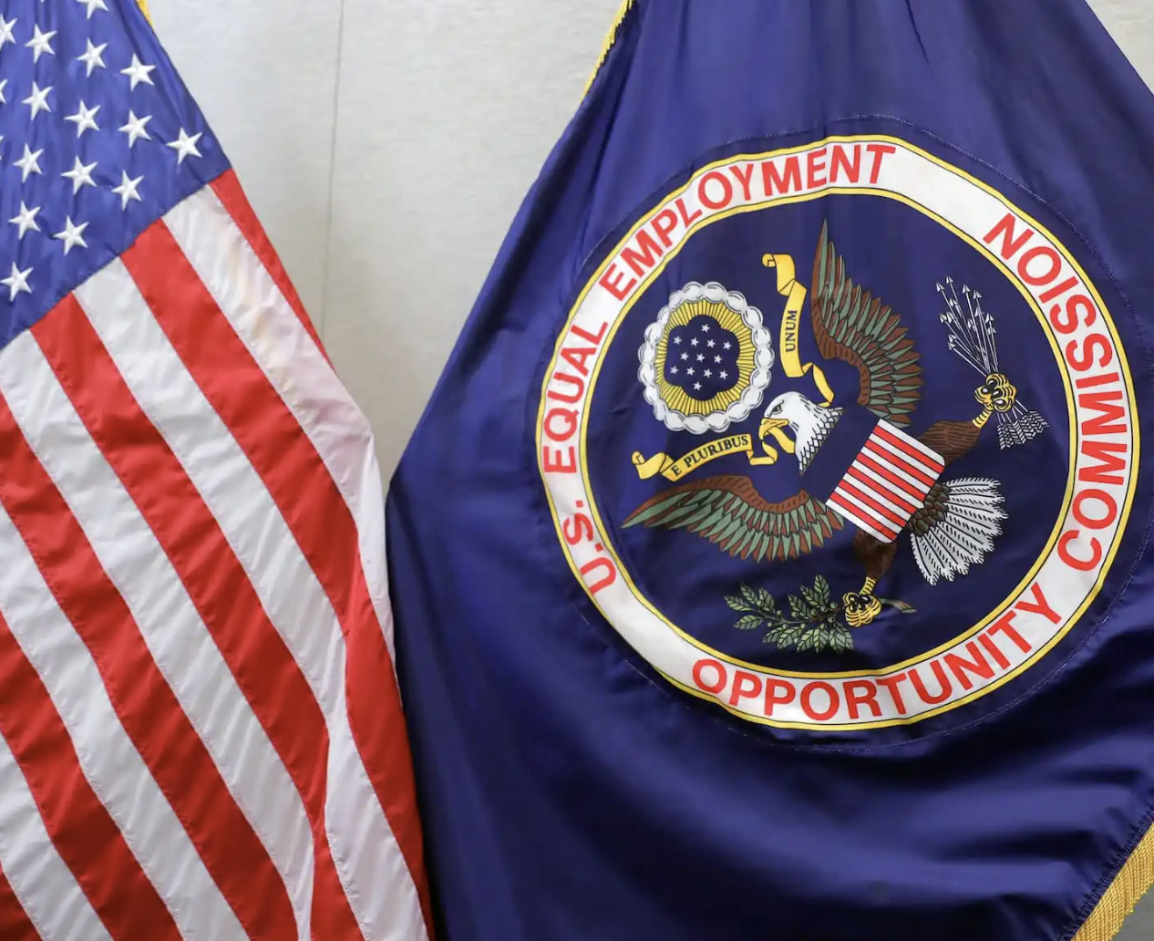 Image of USA Flag and The United States Equal Employment Opportunity Commission Flag 